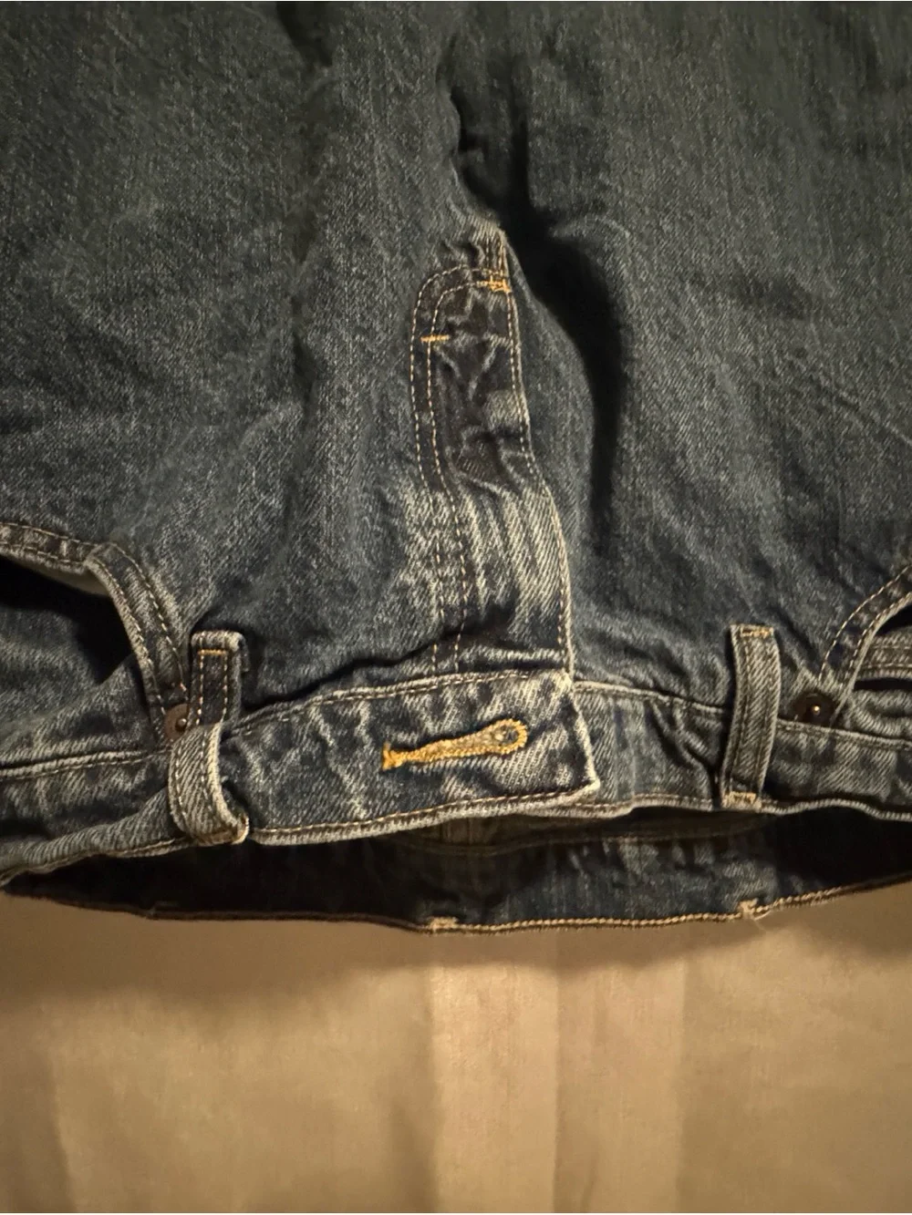 Magellan Outdoors Men’s Relaxed Blue Denim Jeans with Brown Patch